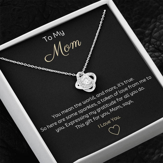 To My Mom, Beautiful Love Knot 14k or 18k finish Necklace. Features a beautiful pendant embellished with premium cubic zirconia crystals.