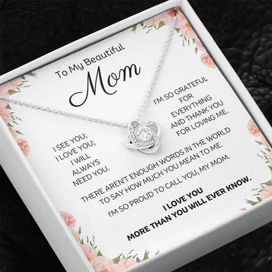 My Beautiful Mom Love Knot 14k or 18k finish Necklace. Features a beautiful pendant embellished with premium cubic zirconia crystals and heartfelt message card.