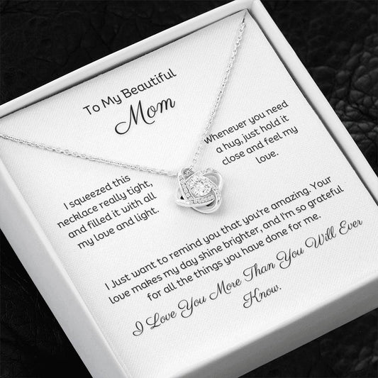 To My Mom, Beautiful Love Knot 14k or 18k finish Necklace. Features a beautiful pendant embellished with premium cubic zirconia crystals and heartfelt message card.