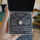 To My Daughter Love Knot Necklace with heartfelt message card and gift box love from Dad. 14k white gold over stainless steel embellished with premium cubic zirconia crystals. Adjustable chain length: 18" - 22" (45.72cm - 55.88cm)