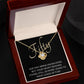 50th Birthday, Beautiful Love Knot 14k or 18k finish Necklace. Features a beautiful pendant embellished with premium cubic zirconia crystals and heartfelt message card.