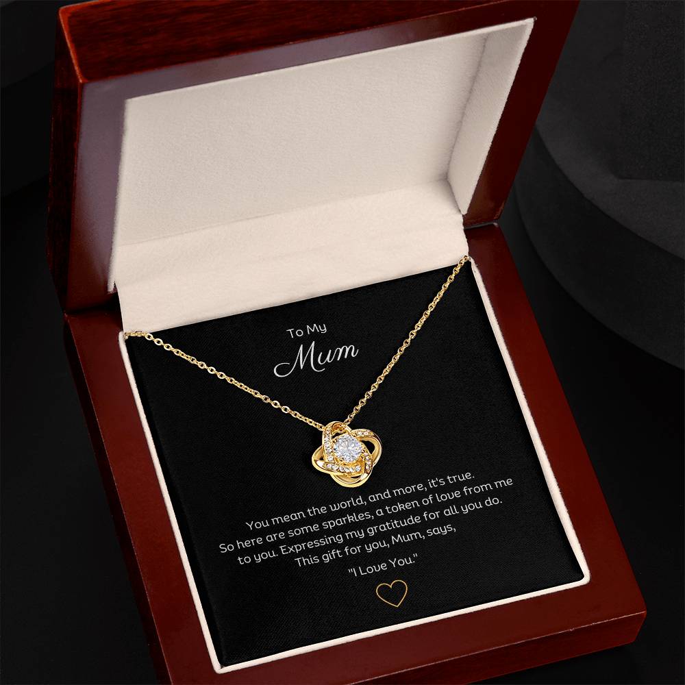 To My Mum, Beautiful Love Knot 14k or 18k finish Necklace. Features a beautiful pendant embellished with premium cubic zirconia crystals.