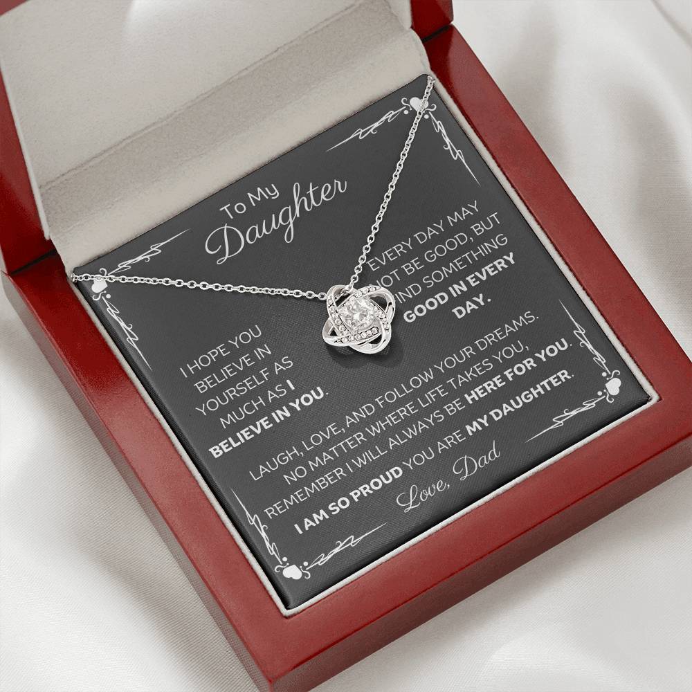 To My Daughter Love Knot Necklace with heartfelt message card and gift box love from Dad. 14k white gold over stainless steel embellished with premium cubic zirconia crystals. Adjustable chain length: 18" - 22" (45.72cm - 55.88cm)