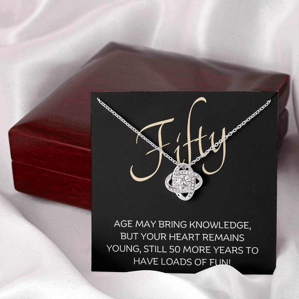 50th Birthday, Beautiful Love Knot 14k or 18k finish Necklace. Features a beautiful pendant embellished with premium cubic zirconia crystals and heartfelt message card.