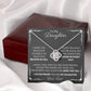 To My Daughter Love Knot Necklace with heartfelt message card and gift box love from Dad. 14k white gold over stainless steel embellished with premium cubic zirconia crystals. Adjustable chain length: 18" - 22" (45.72cm - 55.88cm)