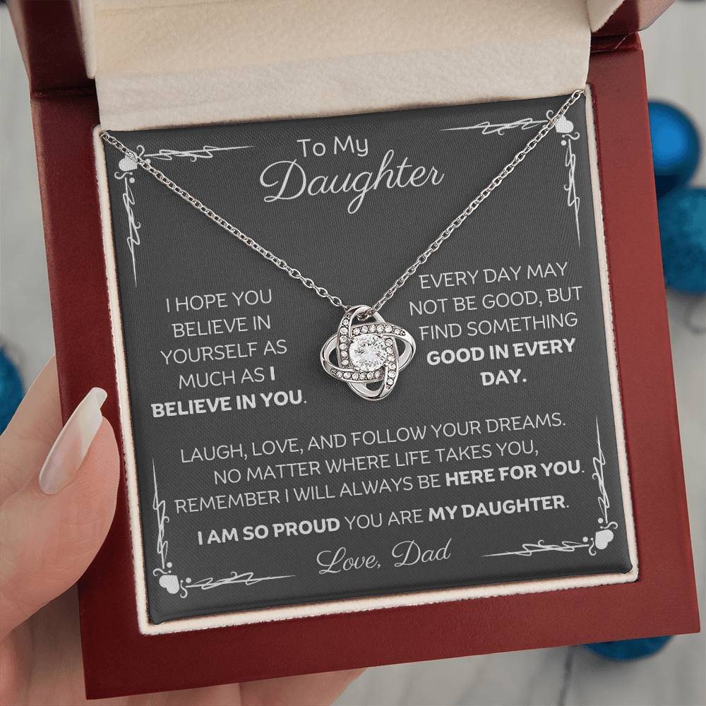 To My Daughter Love Knot Necklace with heartfelt message card and gift box love from Dad. 14k white gold over stainless steel embellished with premium cubic zirconia crystals. Adjustable chain length: 18" - 22" (45.72cm - 55.88cm)