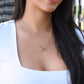 To My Daughter, two lovely interlocking heart pendants embellished with CZ crystals. High quality polished surgical steel and rose gold finish.
