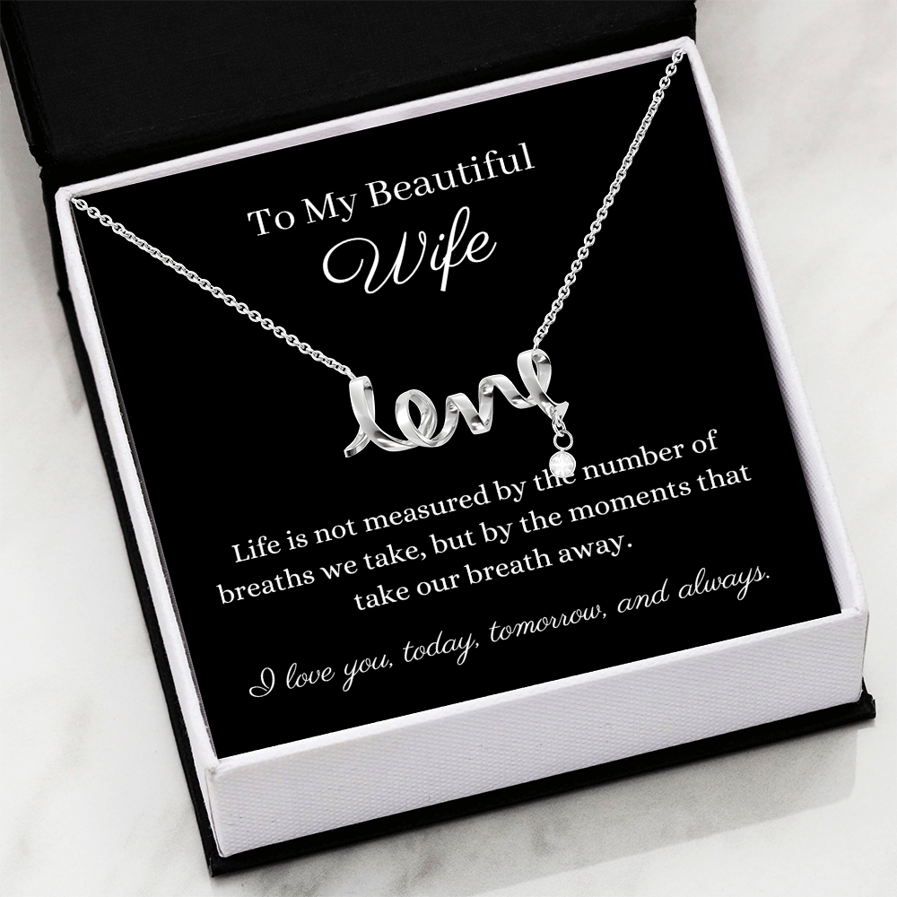 Pendant necklace cursive design spells LOVE. Polished stainless steel or 18k gold finish. Message card To My Beautiful Wife  