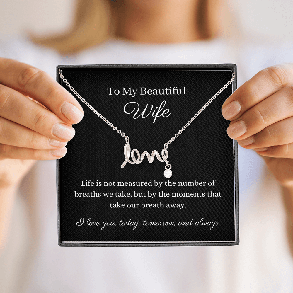 Pendant necklace cursive design spells LOVE. Polished stainless steel or 18k gold finish. Message card To My Beautiful Wife  