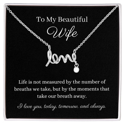 Pendant necklace cursive design spells LOVE. Polished stainless steel or 18k gold finish. Message card To My Beautiful Wife  