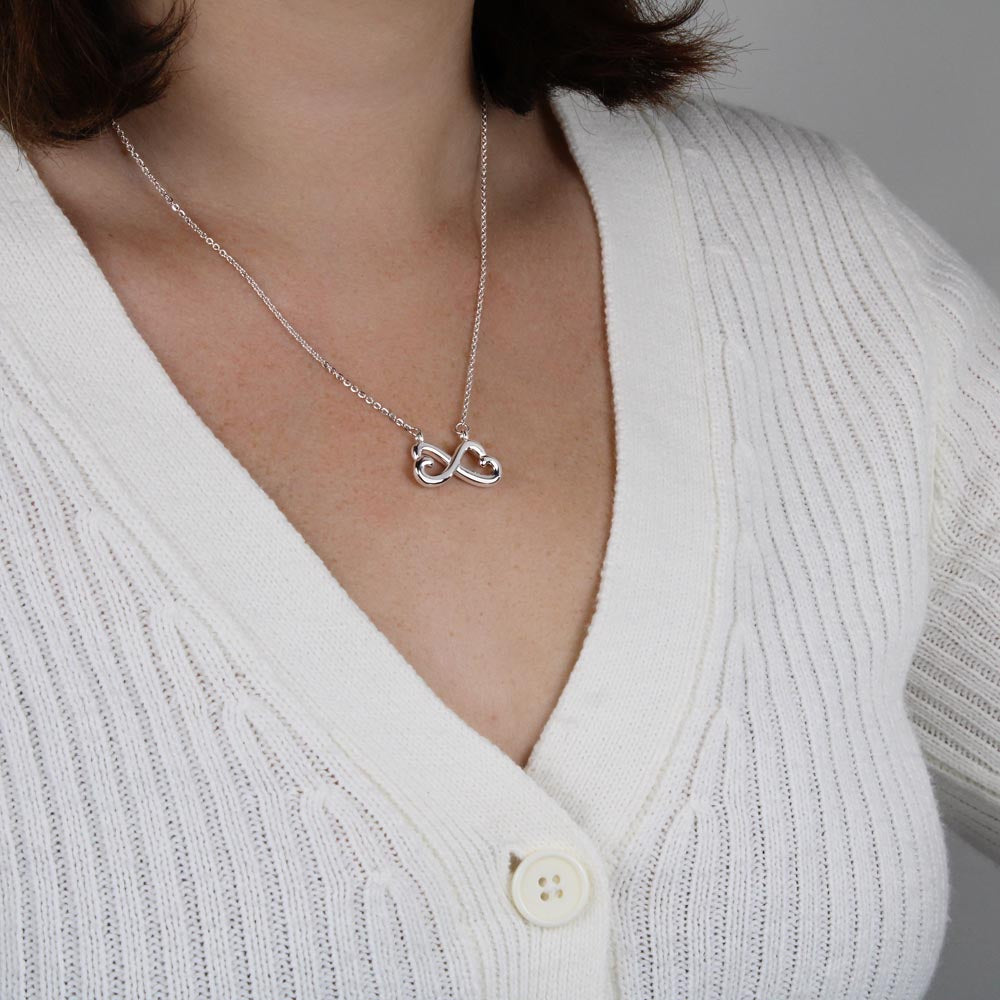 To My Soulmate Infinity Hearts Necklace with message card. crafted in either a 14k white gold finish or an 18k yellow gold finish, this heart-shaped infinity symbol is hand-polished to showcase its magnificent shine