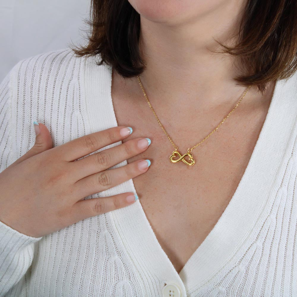 To My Soulmate Infinity Hearts Necklace with message card. crafted in either a 14k white gold finish or an 18k yellow gold finish, this heart-shaped infinity symbol is hand-polished to showcase its magnificent shine