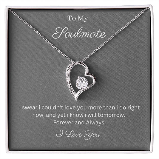 Heart pendant 14k white gold finish or 18k yellow gold finish 6.5mm round cut cubic zirconia stone