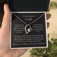 Dazzling Forever Love Necklace and heartfelt message card. This necklace features a stunning 6.5mm CZ crystal surrounded by a polished heart pendant embellished with smaller crystals. 14k white gold finish with adjustable chain length: 18" - 22" (45.72cm - 55.88cm)