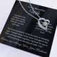 Dazzling Forever Love Necklace and heartfelt message card. This necklace features a stunning 6.5mm CZ crystal surrounded by a polished heart pendant embellished with smaller crystals. 14k white gold finish with adjustable chain length: 18" - 22" (45.72cm - 55.88cm)
