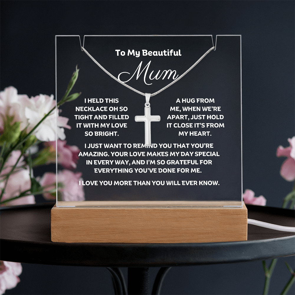 Stunning Square Acrylic with a beautiful heartfelt message to Mum. Includes a  stunning Cross Necklace. Acrylic comes with a stylish wooden LED base, and you can choose between a USB plug-in option OR a cordless battery-operated option. Cross features Stainless Steel Cross, Snake chain, Lobster clasp.  