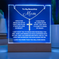 Show Mom how much you love her with this stunning Square Acrylic plaque paired with a beautiful Polished Stainless Cross Pendant Necklace. The beautiful Mom heartfelt message is showcased on crystal-clear acrylic with 7 colour LED lighting, making this set a striking focal point in any space. 