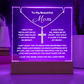 Show Mom how much you love her with this stunning Square Acrylic plaque paired with a beautiful Polished Stainless Cross Pendant Necklace. The beautiful Mom heartfelt message is showcased on crystal-clear acrylic with 7 colour LED lighting, making this set a striking focal point in any space. 