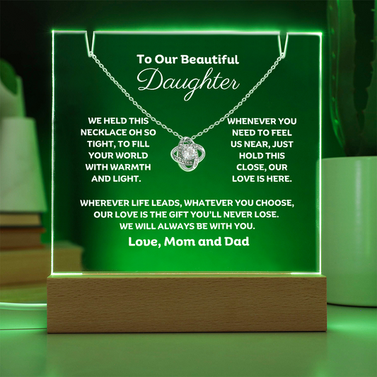 A stunning Square Acrylic and the beautiful Love Knot Necklace for Daughter. The heartfelt message is showcased on crystal-clear acrylic, making this set a striking focal point in any space. 14k white gold over stainless steel or 18k yellow gold over stainless steel with a 6mm round cut cubic zirconia stone.