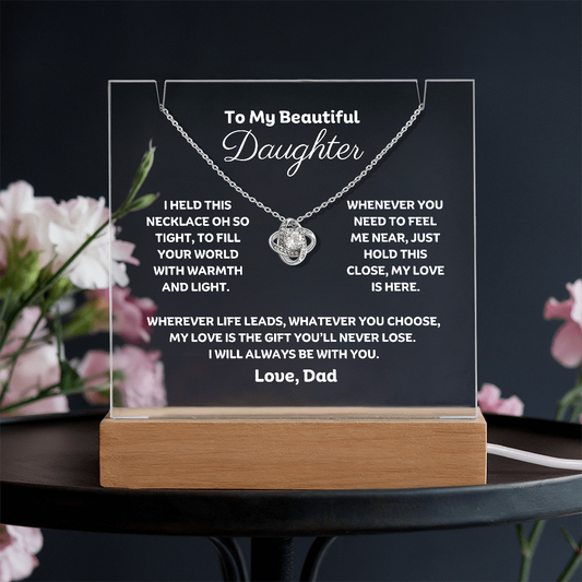 A stunning Square Acrylic and the beautiful Love Knot Necklace for Daughter. The heartfelt message is showcased on crystal-clear acrylic, making this set a striking focal point in any space. 14k white gold over stainless steel or 18k yellow gold over stainless steel with a 6mm round cut cubic zirconia stone.