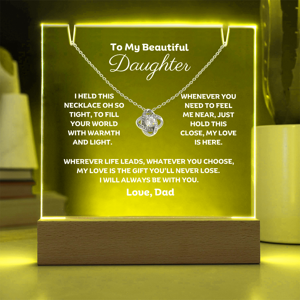 A stunning Square Acrylic and the beautiful Love Knot Necklace for Daughter. The heartfelt message is showcased on crystal-clear acrylic, making this set a striking focal point in any space. 14k white gold over stainless steel or 18k yellow gold over stainless steel with a 6mm round cut cubic zirconia stone.