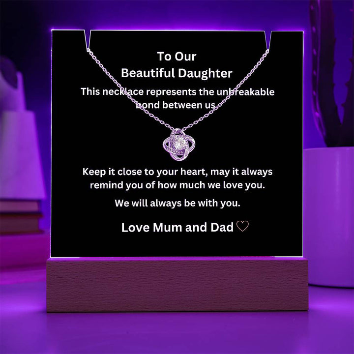 A stunning Square Acrylic and the beautiful Love Knot Necklace. The heartfelt message is showcased on crystal-clear acrylic, making this set a striking focal point in any space. Paired with the charming Love Knot Necklace.