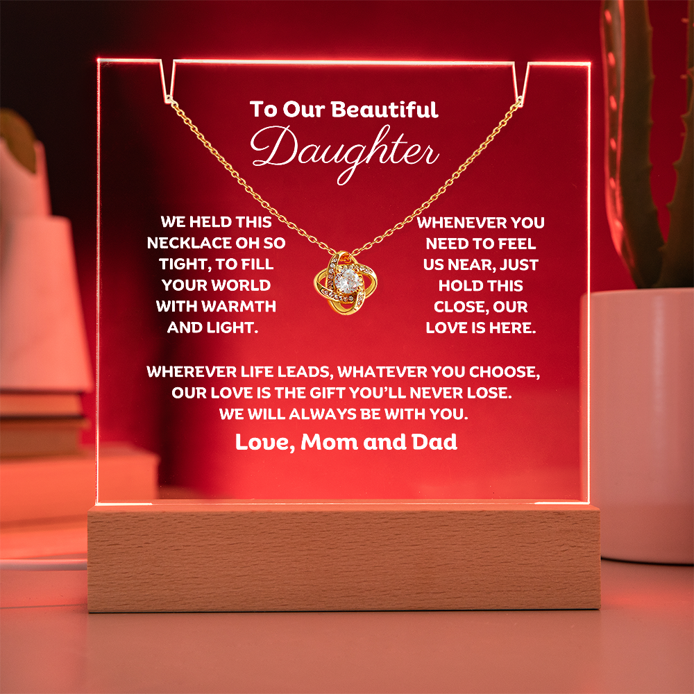 A stunning Square Acrylic and the beautiful Love Knot Necklace for Daughter. The heartfelt message is showcased on crystal-clear acrylic, making this set a striking focal point in any space. 14k white gold over stainless steel or 18k yellow gold over stainless steel with a 6mm round cut cubic zirconia stone.