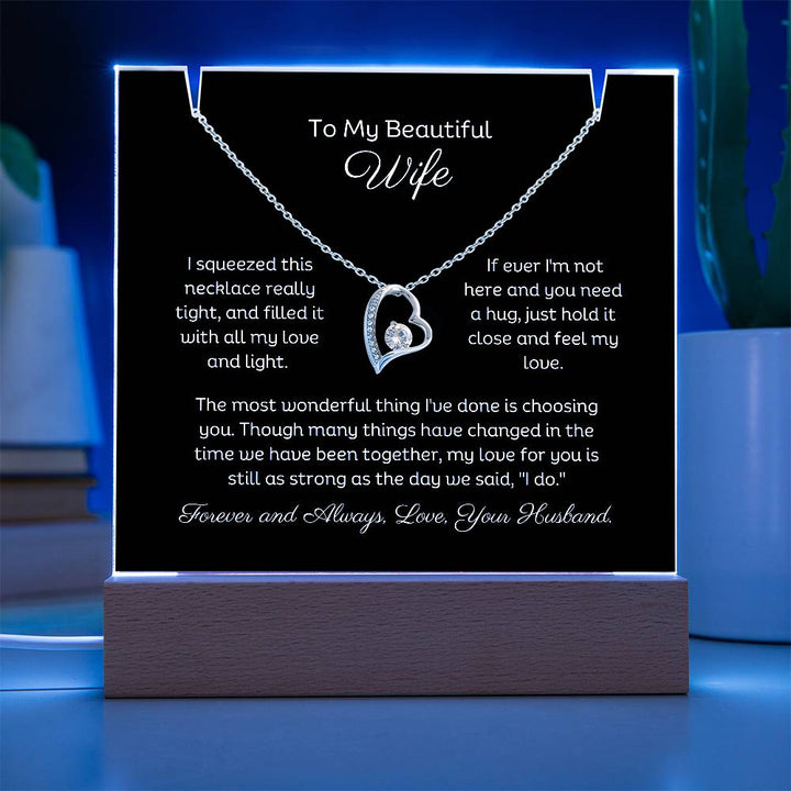 A stunning Square Acrylic and the beautiful Forever Love Heart Necklace. The beautiful wife heartfelt message is showcased on crystal-clear acrylic, making this set a striking focal point in any space. Paired with the charming Forever Love Heart Necklace.