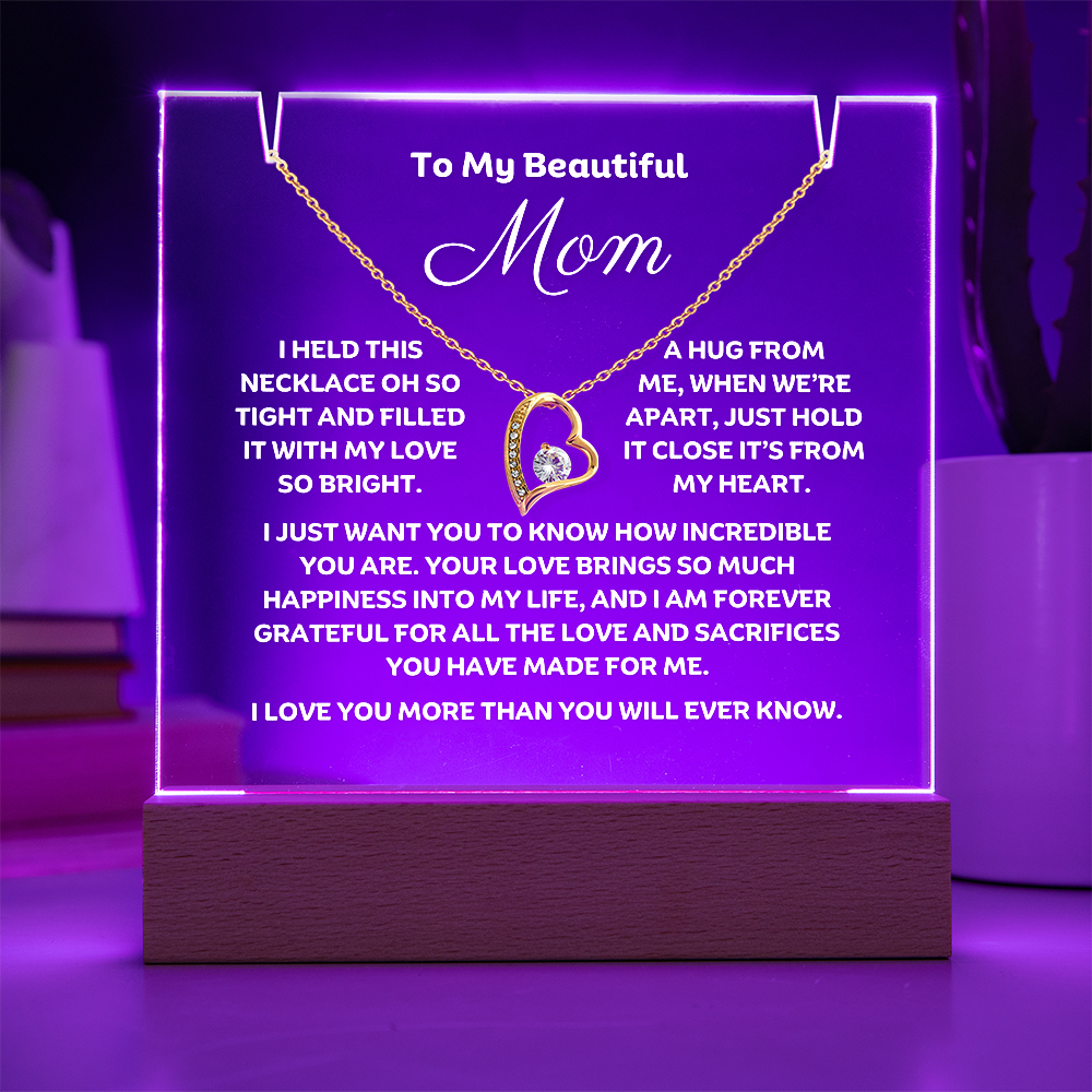 Sow Mom how much you love her with this stunning Square Acrylic and the beautiful Forever Love Heart Necklace for Mum. The beautiful wife heartfelt message is showcased on crystal-clear acrylic, making this set a striking focal point in any space. Paired with the charming Forever Love Heart Necklace in 14k white Gold or 18k gold plated.