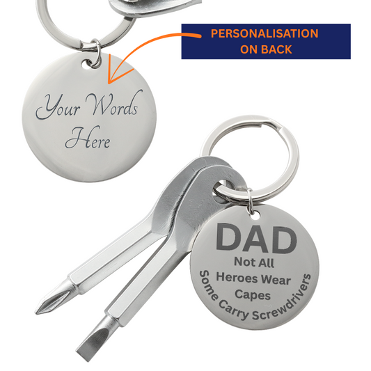 Engraved  keychain screwdriver for DAD with flathead and Philips. Message reads DAD not all heroes wear capes, some carry screwdrivers. Add your own engraved message on the back. Colour Black or Silver.