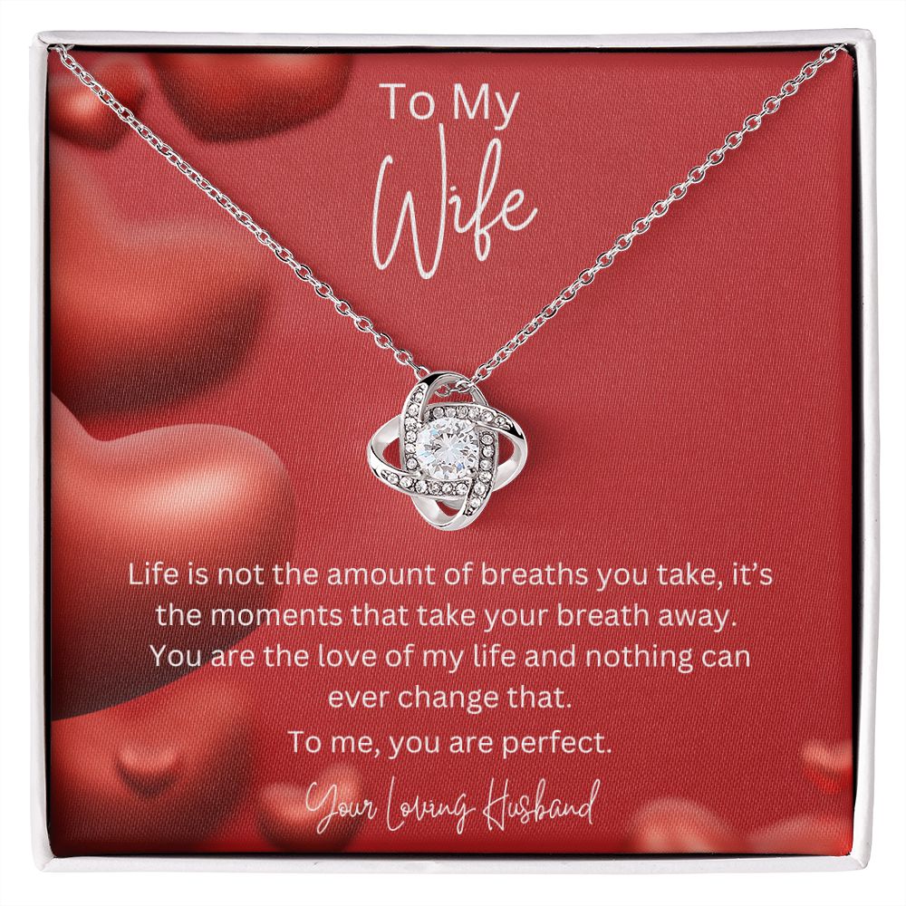 To My Wife Love Knot Necklace features a beautiful pendant embellished with premium cubic zirconia crystals. 14k white gold over stainless steel or 18k yellow gold over stainless steel with a heartfelt message card.