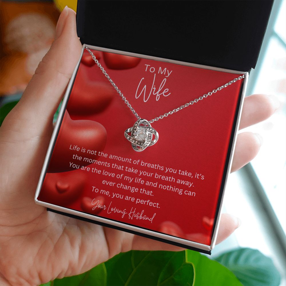 To My Wife Love Knot Necklace features a beautiful pendant embellished with premium cubic zirconia crystals. 14k white gold over stainless steel or 18k yellow gold over stainless steel with a heartfelt message card.