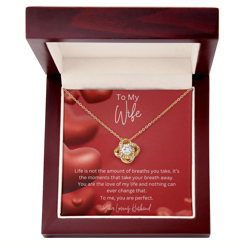 To My Wife Love Knot Necklace features a beautiful pendant embellished with premium cubic zirconia crystals. 14k white gold over stainless steel or 18k yellow gold over stainless steel with a heartfelt message card.