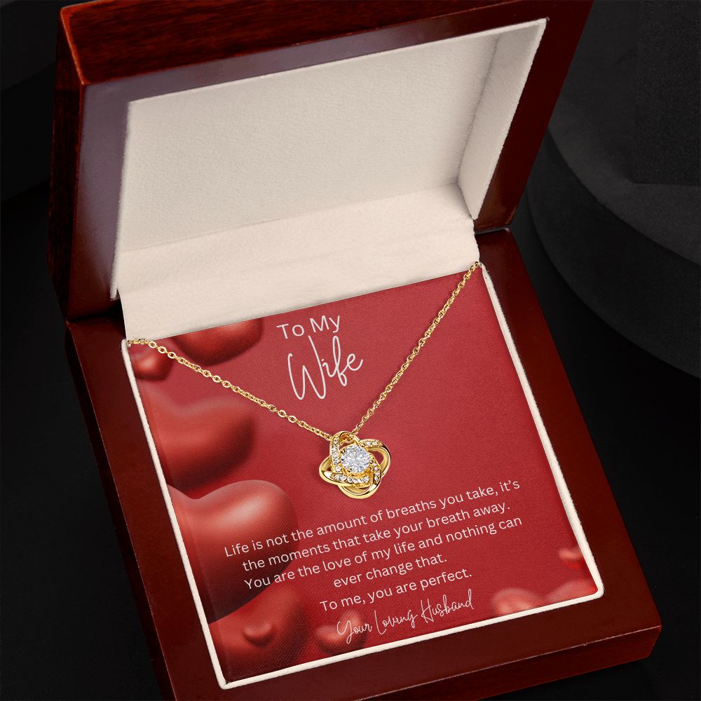 To My Wife Love Knot Necklace features a beautiful pendant embellished with premium cubic zirconia crystals. 14k white gold over stainless steel or 18k yellow gold over stainless steel with a heartfelt message card.