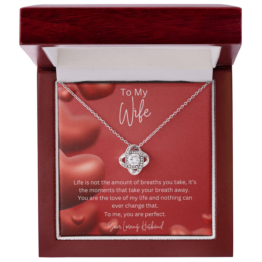 To My Wife Love Knot Necklace features a beautiful pendant embellished with premium cubic zirconia crystals. 14k white gold over stainless steel or 18k yellow gold over stainless steel with a heartfelt message card.